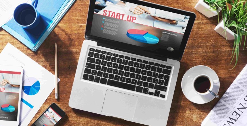 coffee and a website on a web designers desk